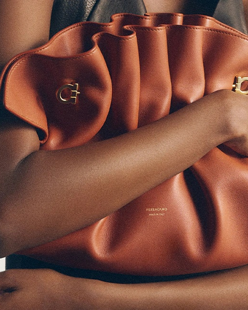 SIGNATURE LEATHER HANDBAG